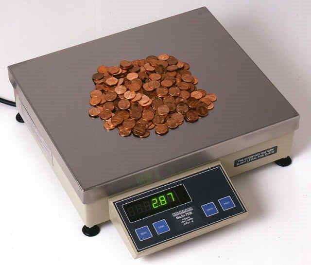 Counting scale weighing coins